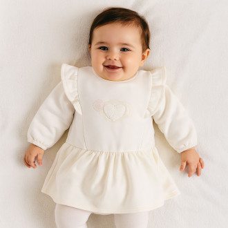 Бебешка ватирана рокля с къдрички в кремаво