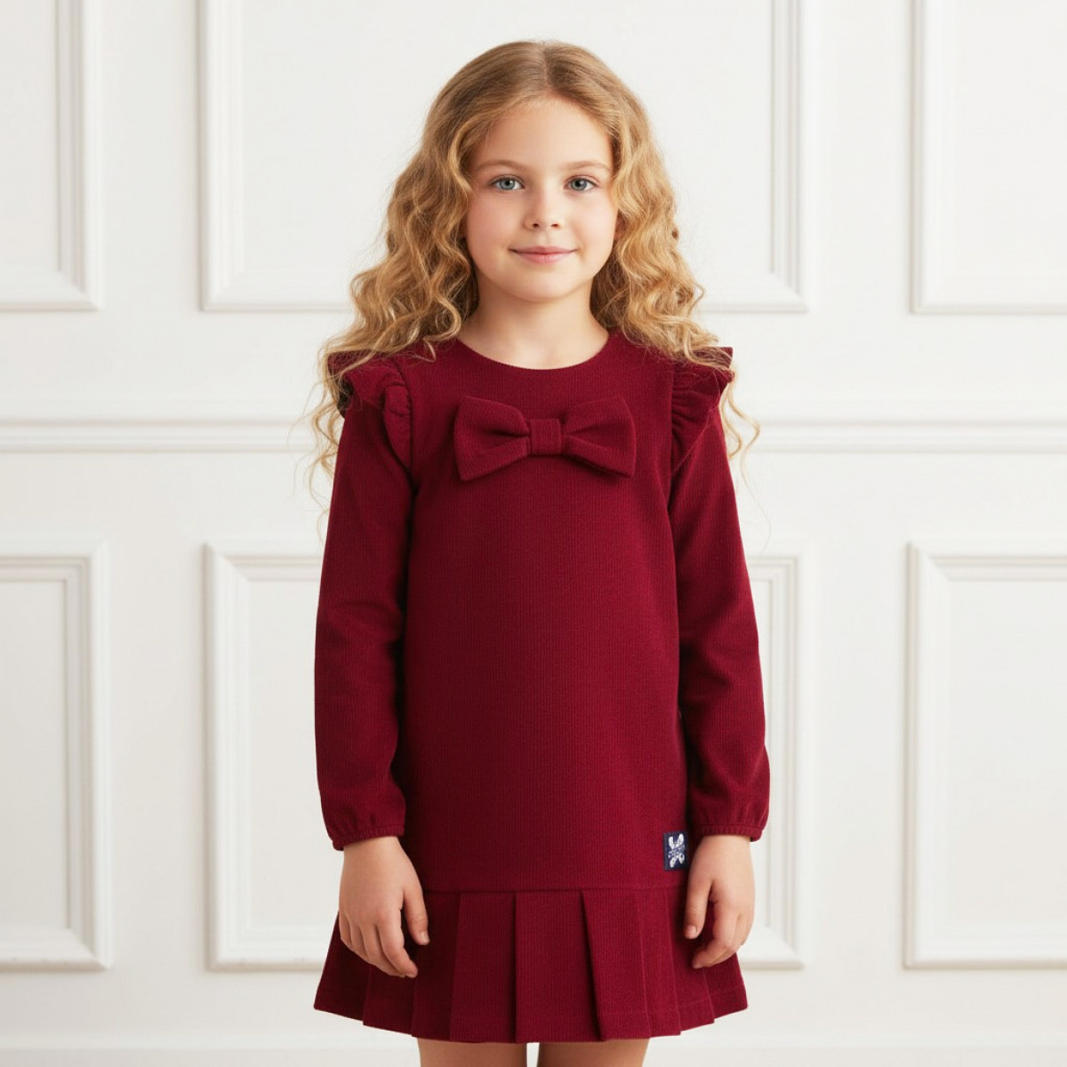 Плътна детска рокля от плетиво с волани